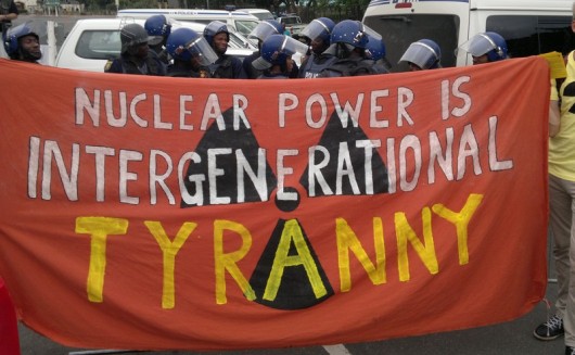 Anti-nuclear banner and police